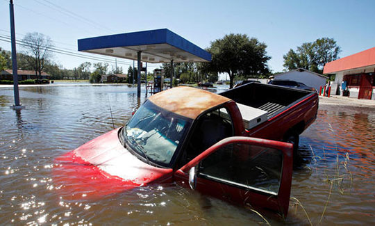 car sinking in water